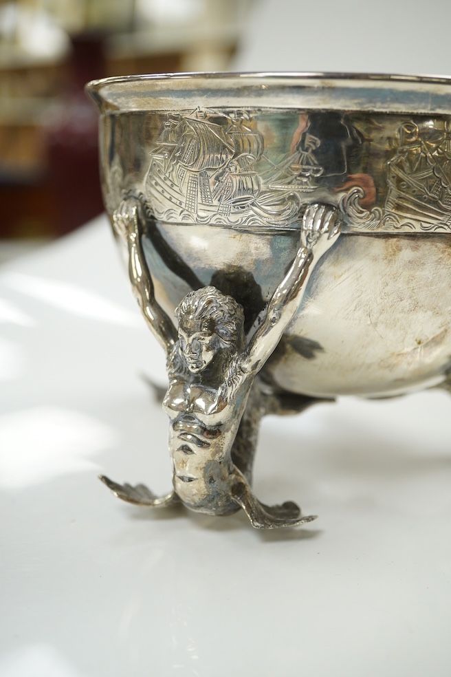 A George V Hanau silver bowl, import marks for Berthold Muller, with three Mermaid supports, London, 1912, diameter 13cm, 11.8oz. Condition - poor